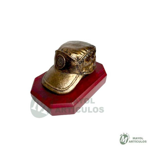 Gorra CNP en bronce con base de madera