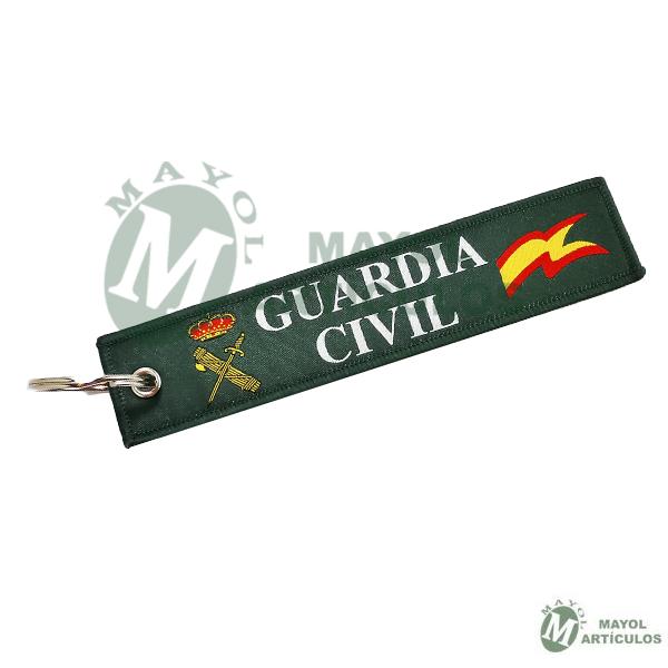 Llavero elaborado en tela  por un lado Emblema y Bandera sobre fondo verde  y por el otro "EL HONER ES MI DIVISA"